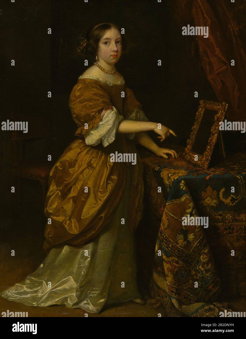 Girl Standing before a Mirror Date: 1668, Caspar Netscher Dutch, 1639–1684 Stock Photo