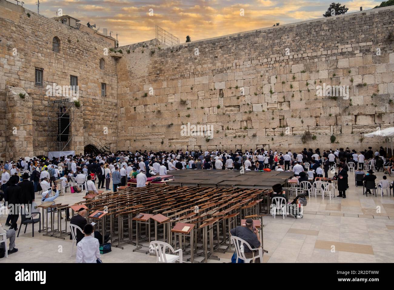 Jewish praying  at the Western Wall or Kotel, during the passover 2023. The Western Wall is the  holiest place in Judaism. Jerusalem, Israel Stock Photo