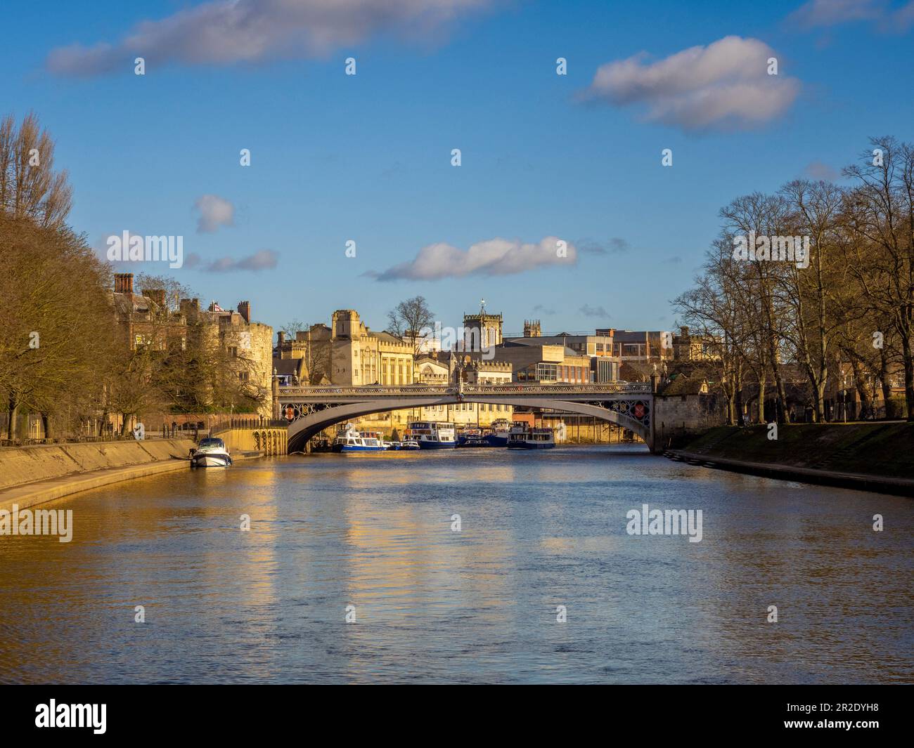 Lendal bridge shot from the river Ouse with the Guildhall behind on a sunny winter day. Stock Photo
