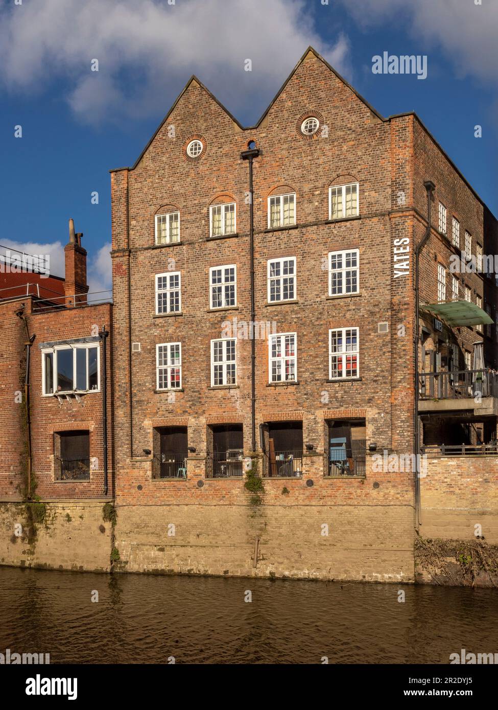 Yates pub seen from the river Ouse. York. UK Stock Photo