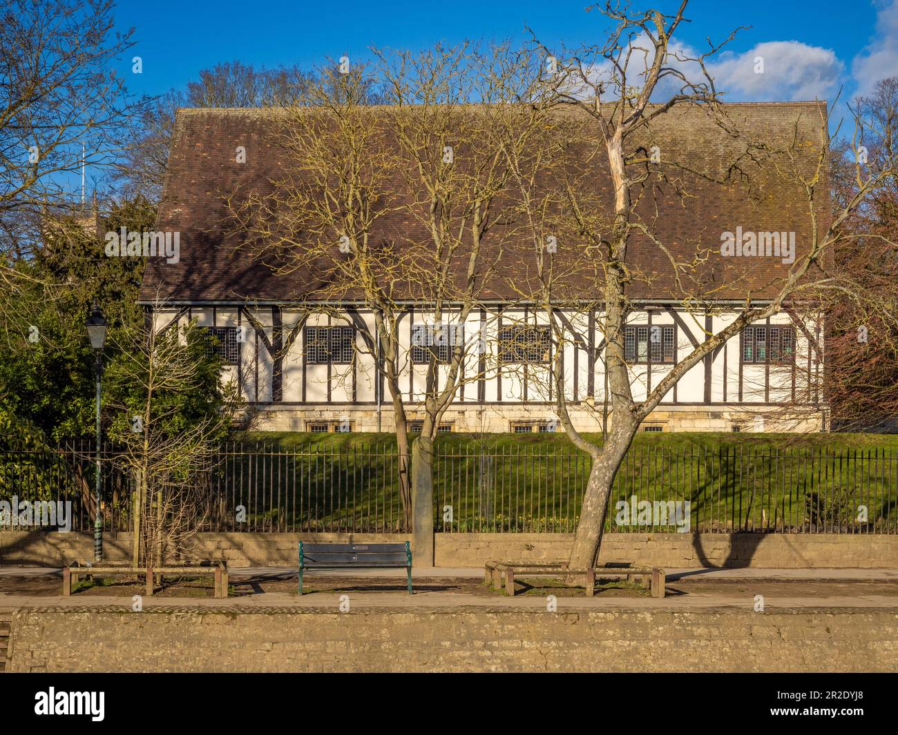 The Hospitium with its exposed timber-frame situated in the Museum gardens. Seen from the river Ouse. York. UK Stock Photo