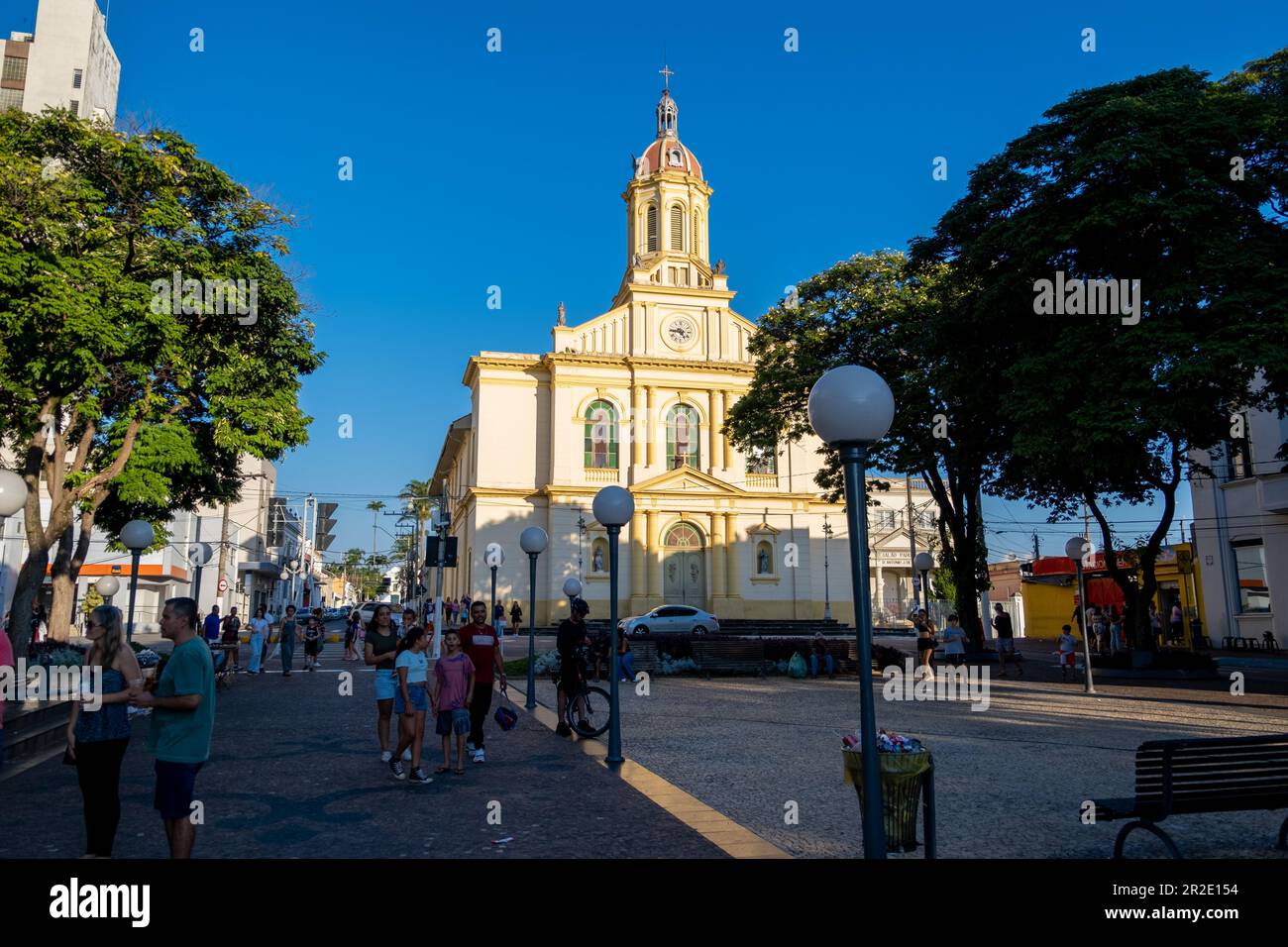Itu, Sao Paulo, Brasil May 01, 2023. People enjoy the holiday with the Parish of Nossa Senhora da Candelária at background Stock Photo
