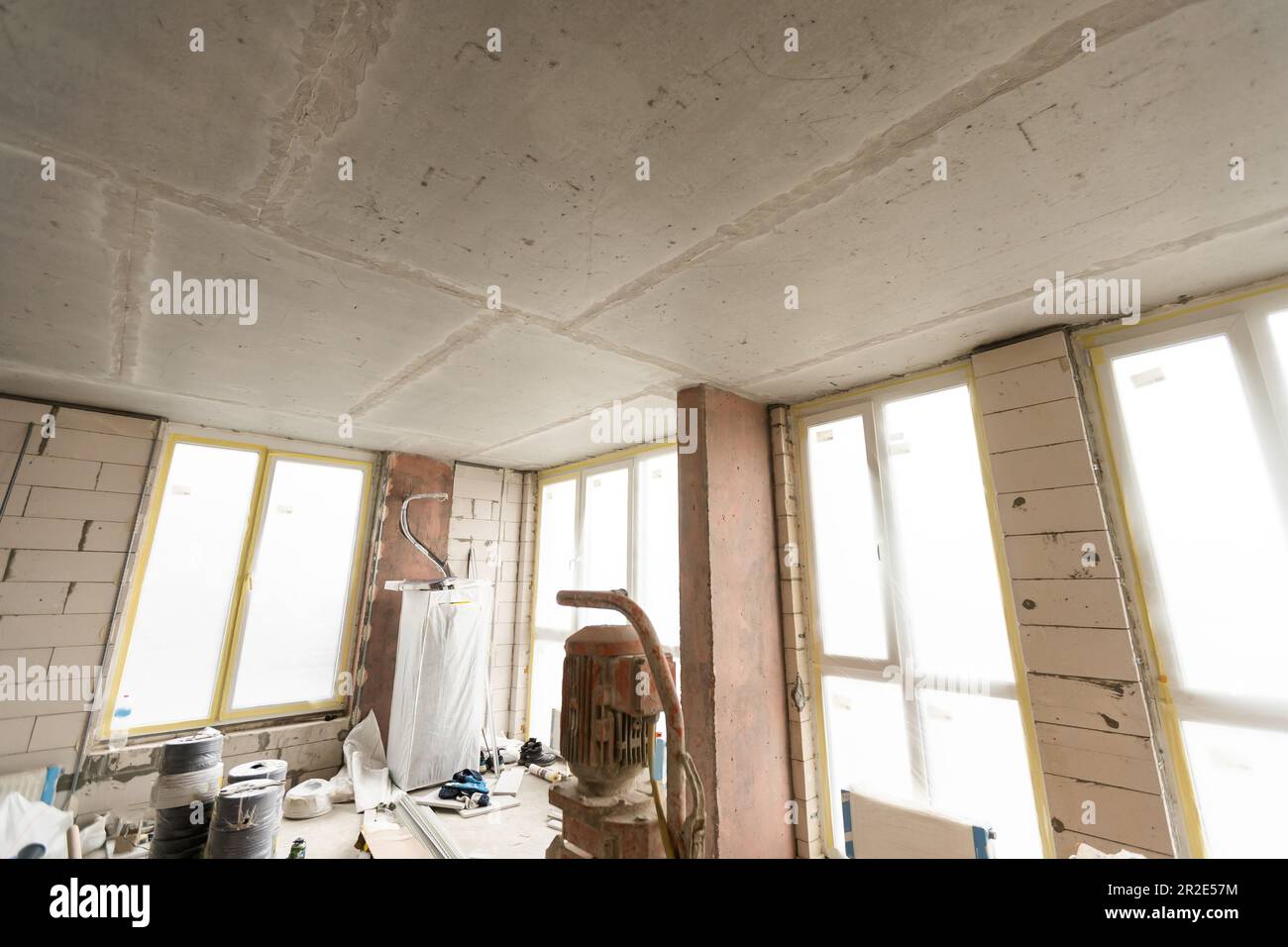 A specialized mixer for mixing dry plaster with water and automatically