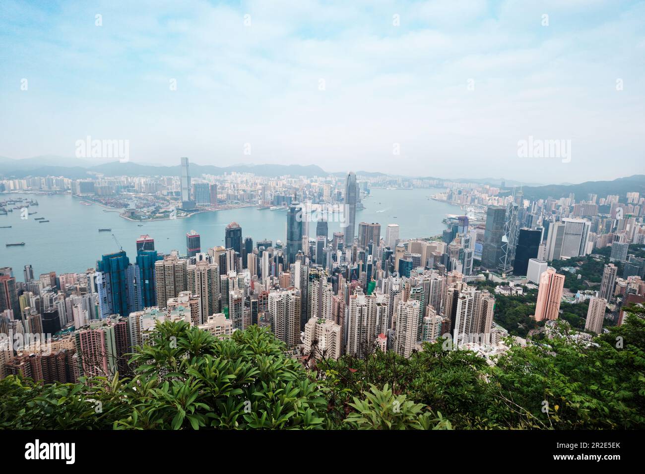 Hong Kong SAR, China - April 2023: Cityscape skyline seen from Lugard Road on Victoria Peak. Magneficent high rise architecure and settlement of HK Stock Photo