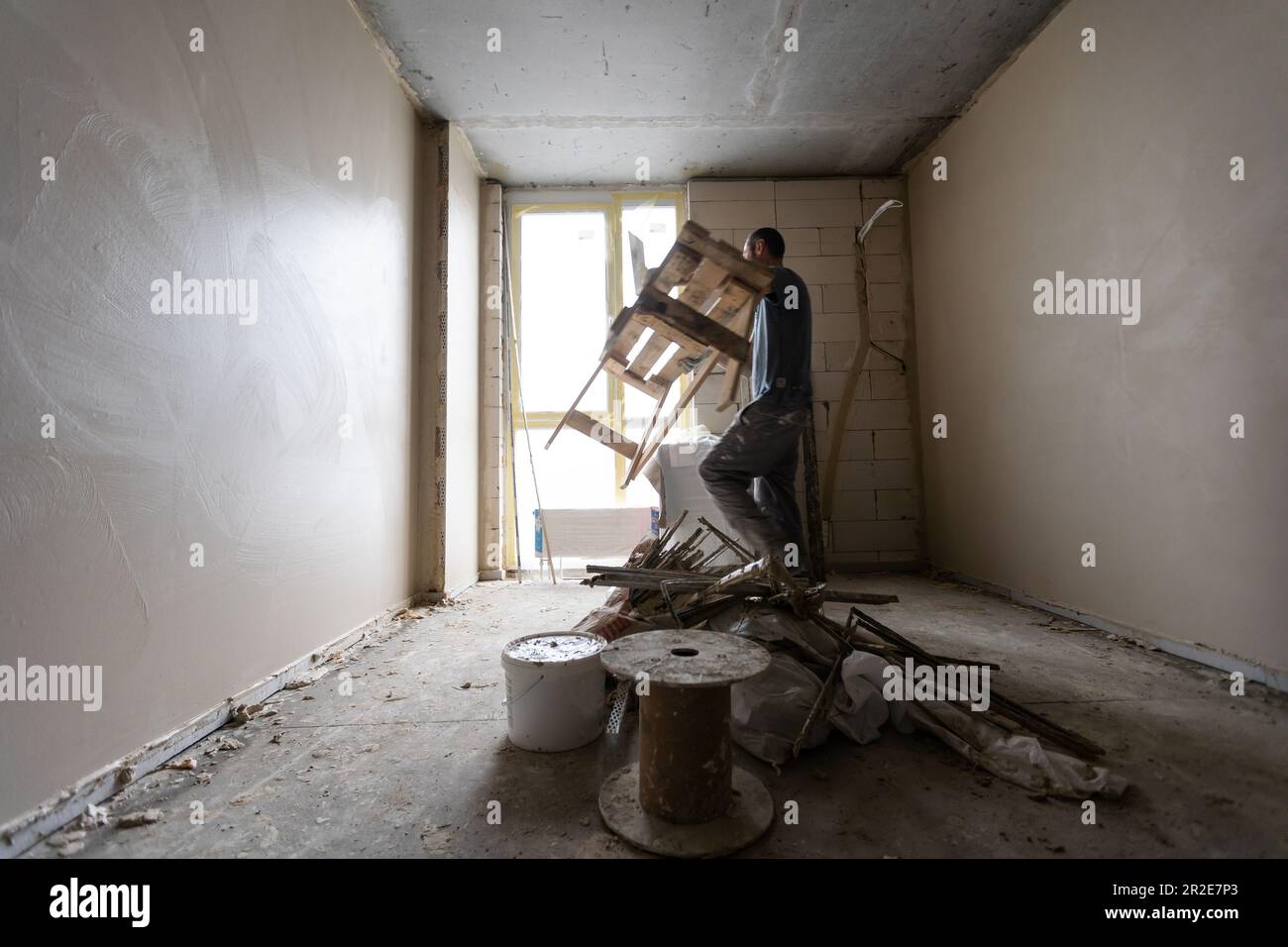 Curated visual reference: Construction Worker Wearing Worker Overall With Wall Plastering Tools Photo Inspiration