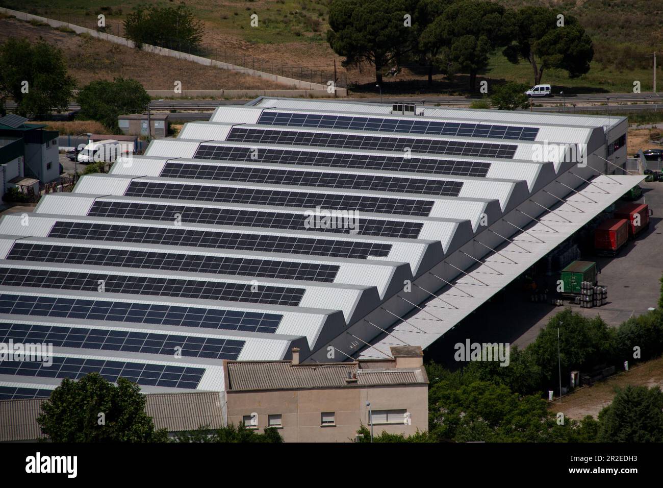 Electric power solar panels placed on the roof of an industrial