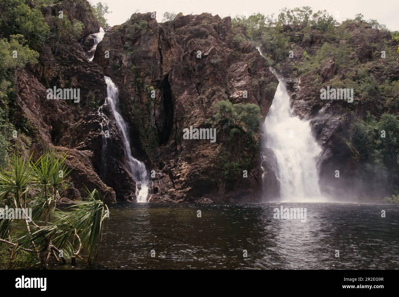 The Wangi Falls is a segmented waterfall on the Wangi Creek located within the Litchfield National Park in the Northern Territory of Australia. Stock Photo