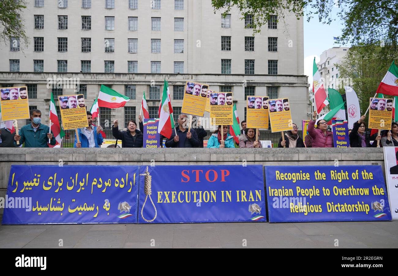 People protesting outside Downing Street in London about the recent