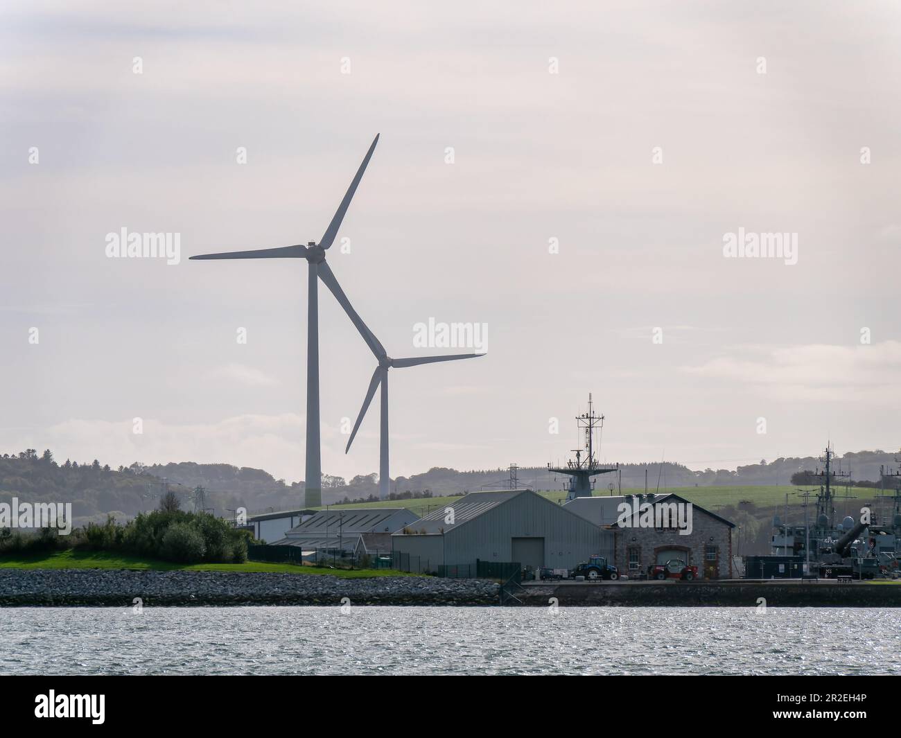 Wind power generators in the Ireland, landscape. Two wind turbines