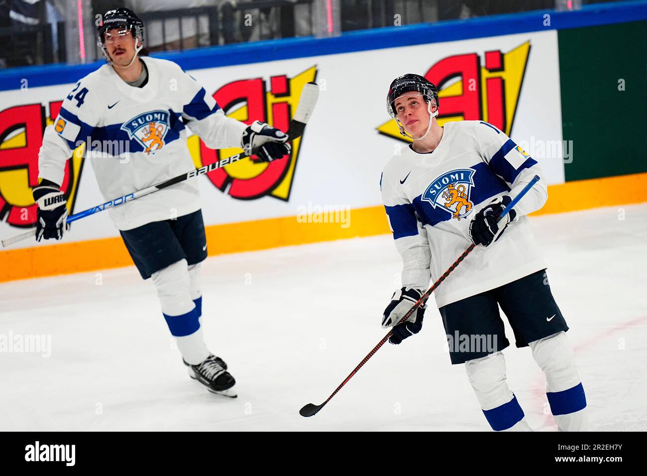 Finland's Waltteri Merela, right, celebrates with Hannes Bjorninen after  scoring his side's sixth goal during the group A match between Hungary and  Finland at the ice hockey world championship in Tampere, Finland,