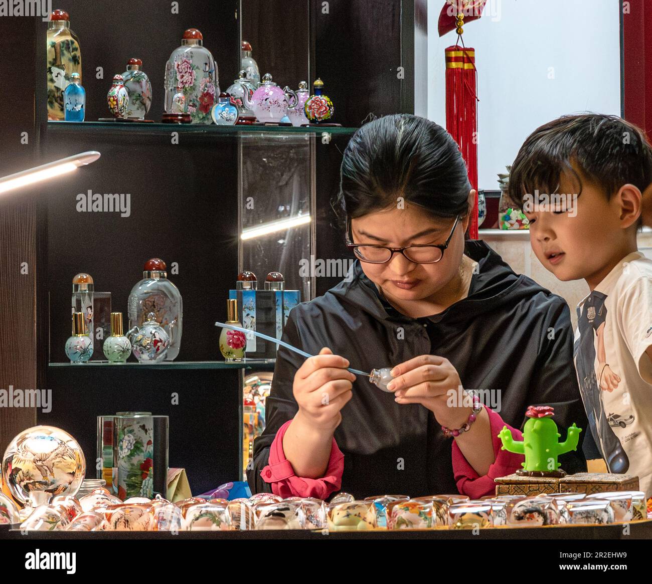 Traditional 'inside' Bottle Painting in a traditional Hutong home, Beijing Stock Photo