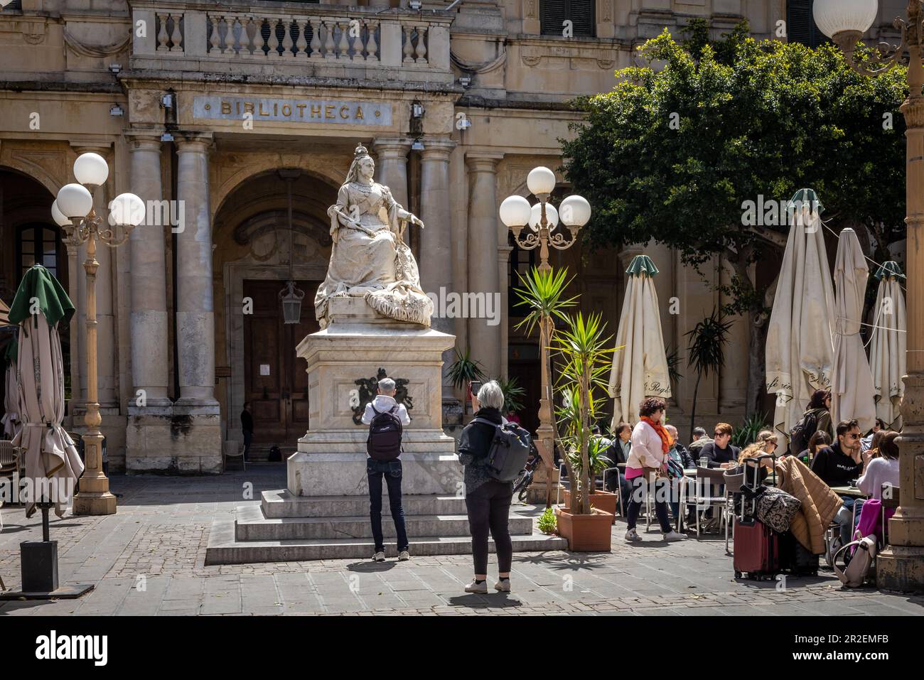 Valletta, Malta April 16, 2023 A statue of Queen Victoria in front of the National Library of