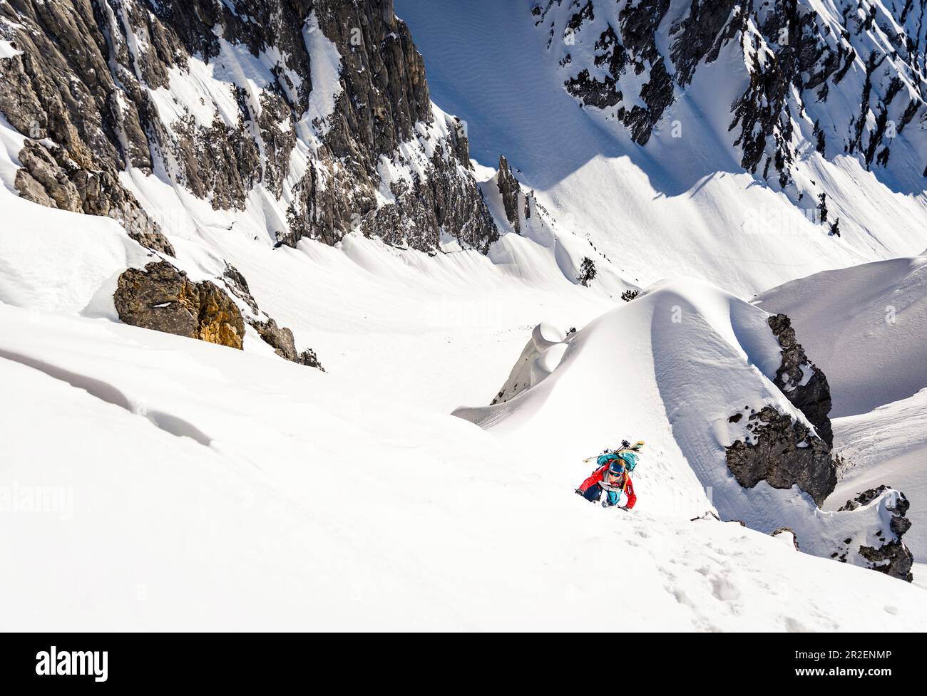 Top view of young female ski alpinist on the climb with crampons and ice ax  in the winter mountains, Wilder Kaiser, Tyrol, Austria Stock Photo - Alamy