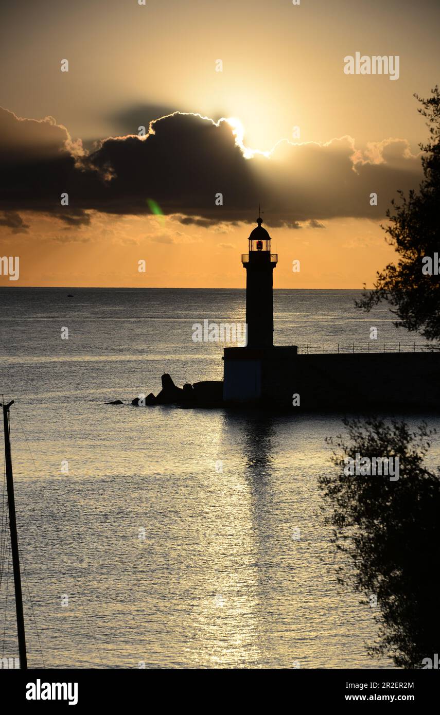 Sunrise view of the sea with harbor with lighthouse, Bastia, North Corsica, France Stock Photo