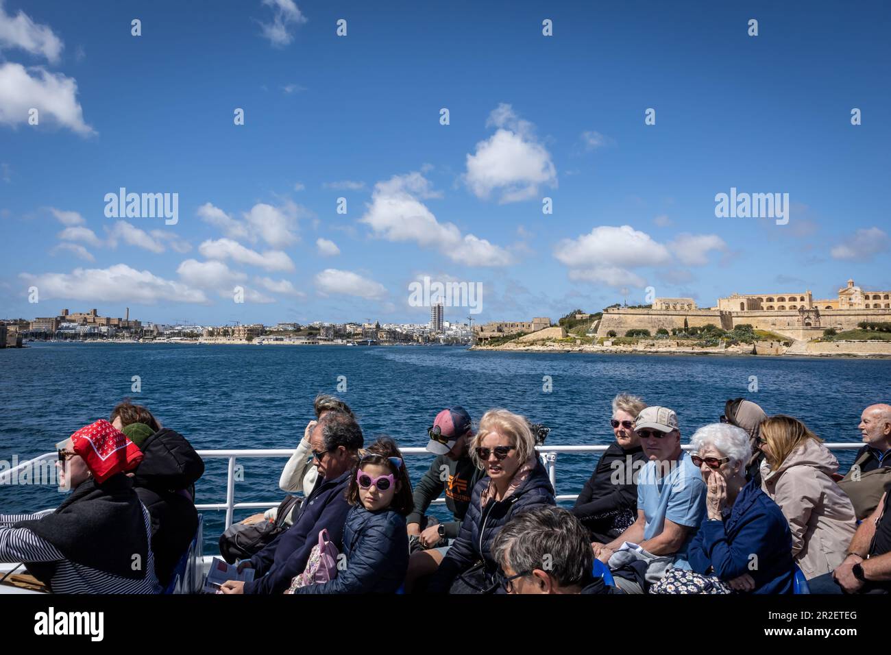 Sliema, Malta - April 18, 2023:  Passengers sitting on Valletta Sliema ferry ship. Stock Photo