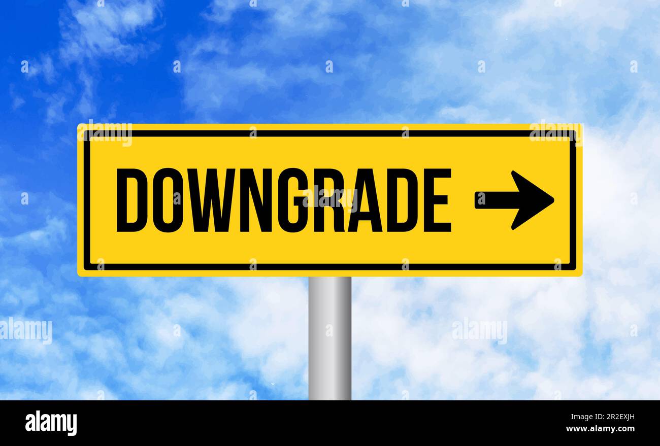 Downgrade road sign on sky background Stock Photo