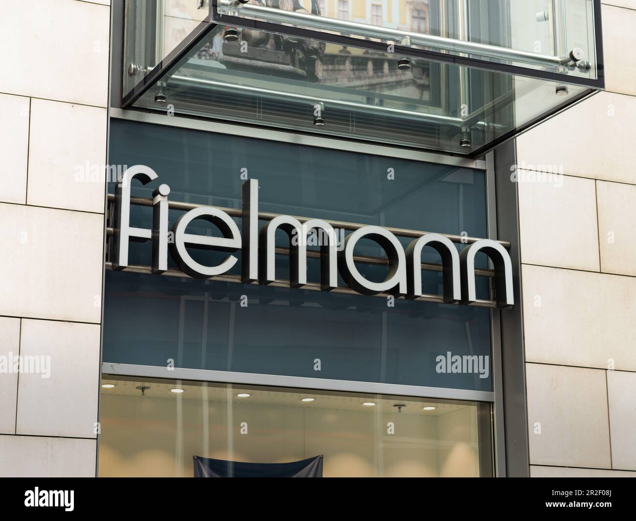 Fielmann logo of the German eye-wear retailer. Sign on the facade of a  chain store of the big optician. Building exterior of a shopping mall Stock  Photo - Alamy