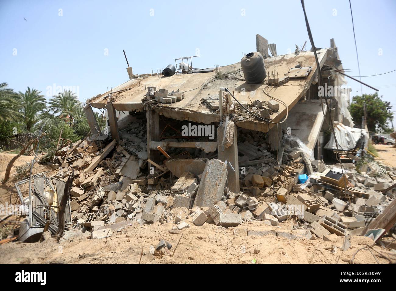 A destroyed building belonging to the Al-Bashir Family after the Israeli attacks in Deir Balah, Gaza City. Palestine. Stock Photo