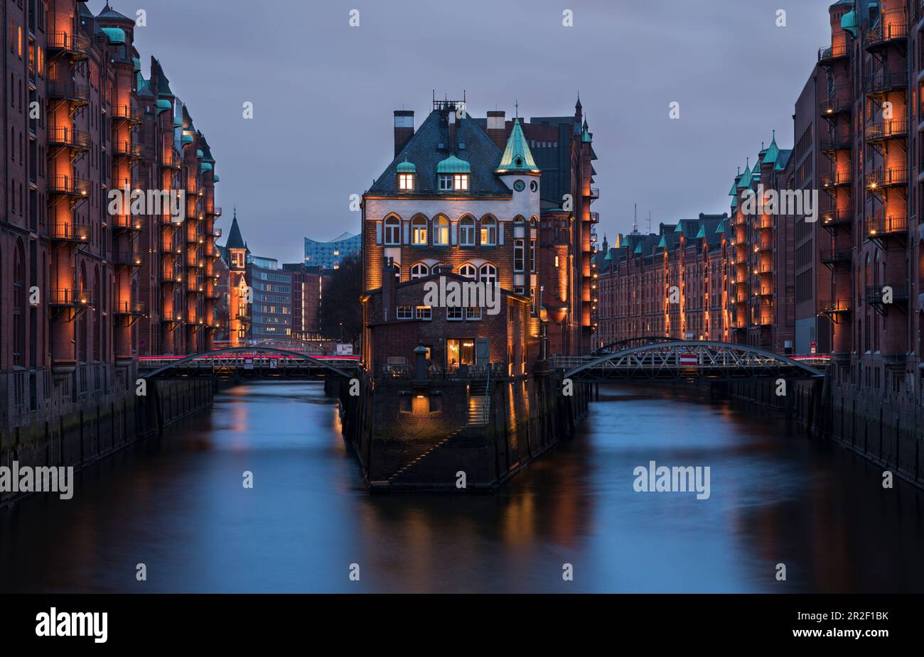 Hamburg Speicherstadt on the Poggenmuehlen-Bruecke with moated castle ...