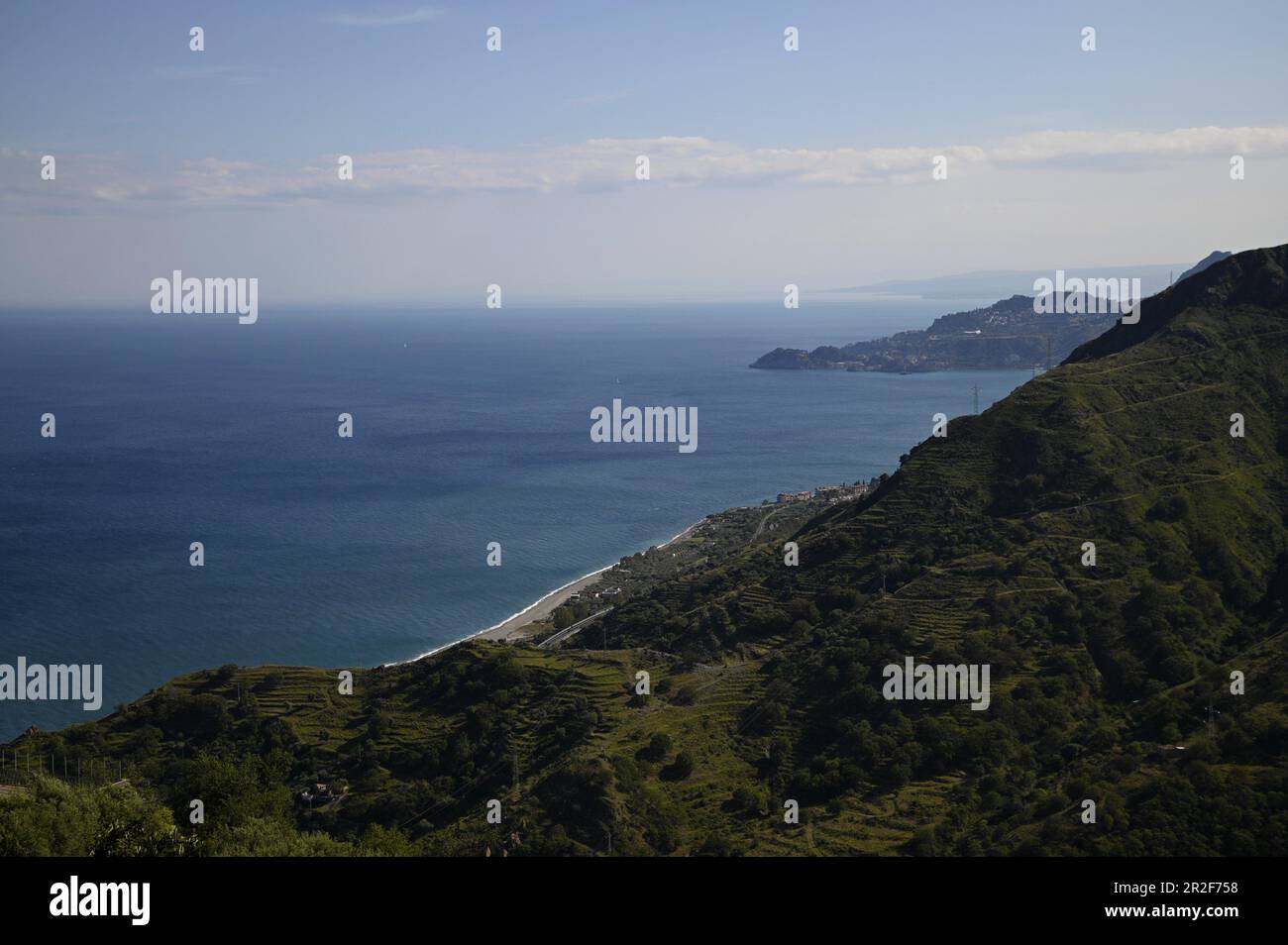 Landscape with scenic view of Spiaggia di Forza d'Agrò a sandy beach between Taormina and Letojanni in Sicily, Italy. Stock Photo