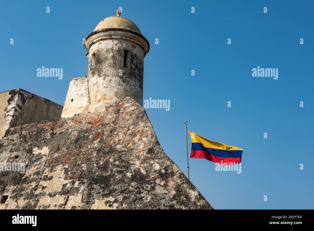 The national flag flies from the city walls of the historic and