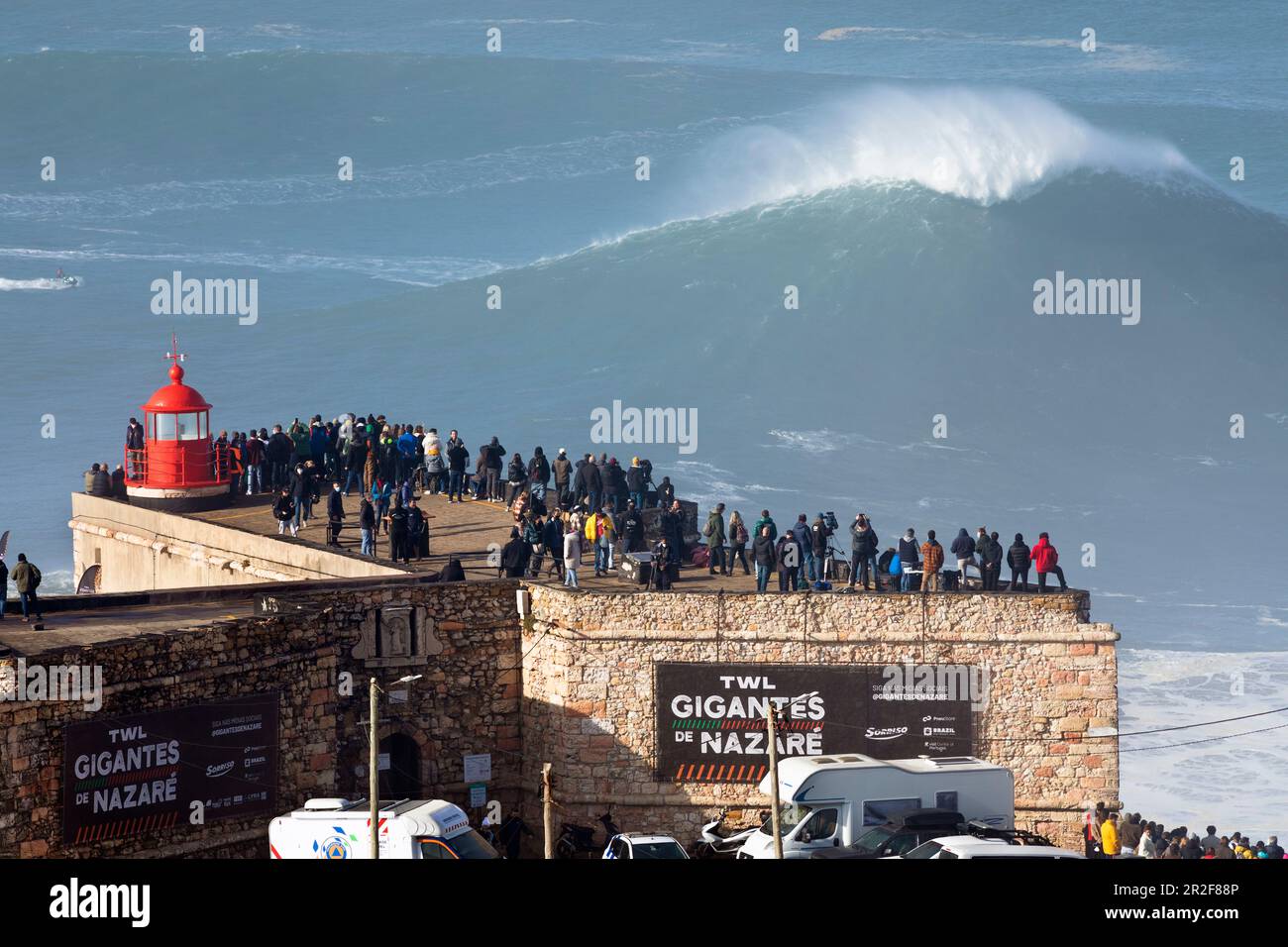 Europe, Portugal, Oeste Region, Nazaré, Crowd watching the Huge Waves from Forte de Sao Miguel Arcanjo during Free Surfing Event 2022 Stock Photo