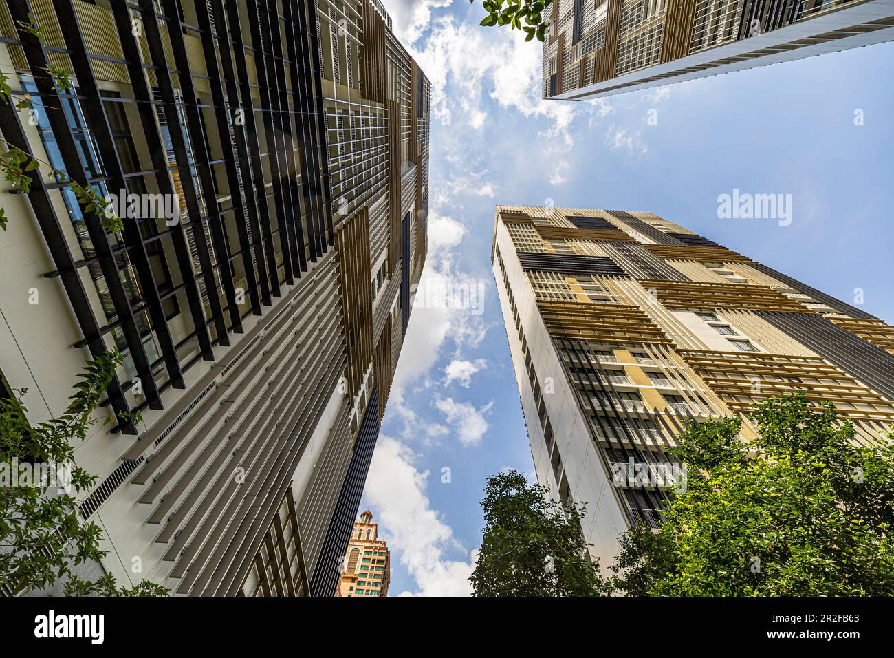 Bottom view of modern skyscrapers in Lower Sukhumvit, Bangkok, Thailand Stock Photo