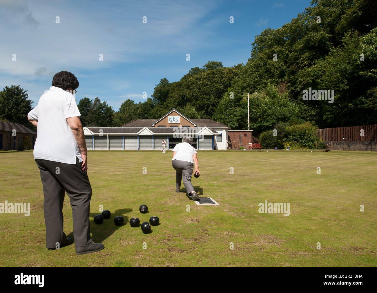 Bowls in play in front of the pavilion at the Kilmarnock lawn bowling