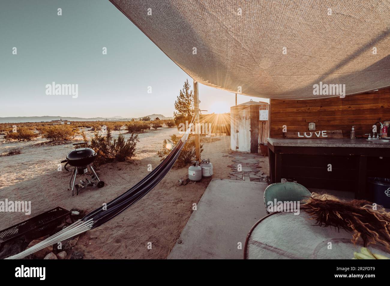 Airbnb property with caravan and outdoor area in Joshua Tree National Park, Joshua Tree, Los Angeles, California, USA, North America Stock Photo