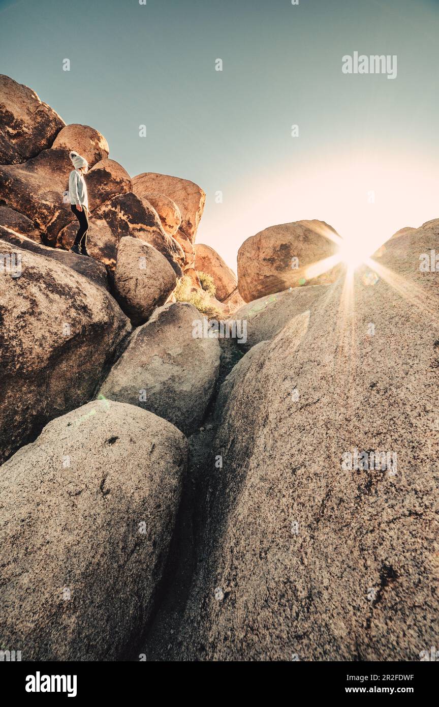 Woman hikes between rocks hi-res stock photography and images - Alamy