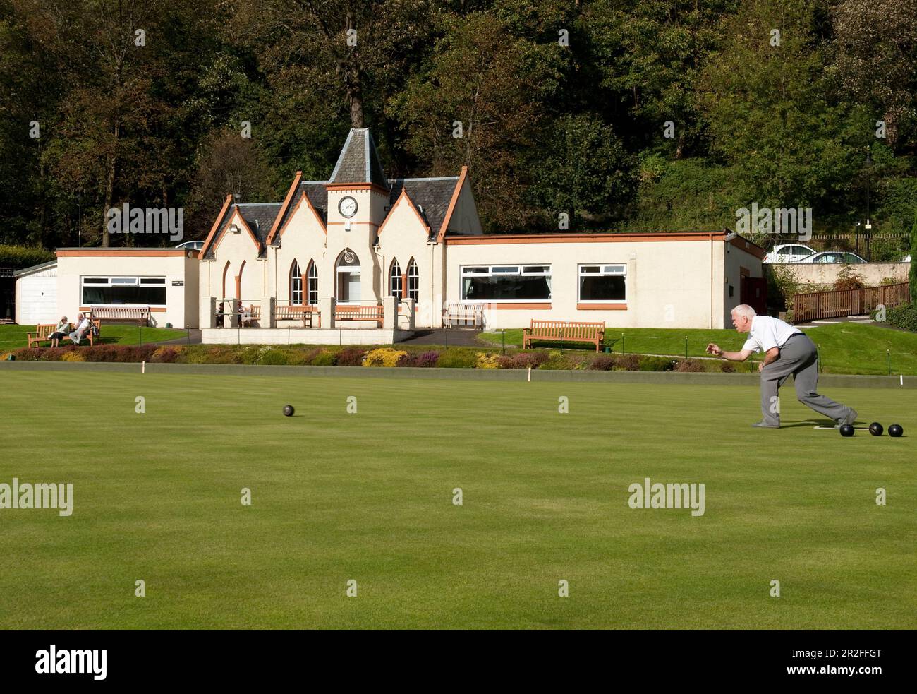 Bowls in play in front of the pavilion of the Stirling lawn bowling club  green in Stirling, Scotland, UK Stock Photo - Alamy