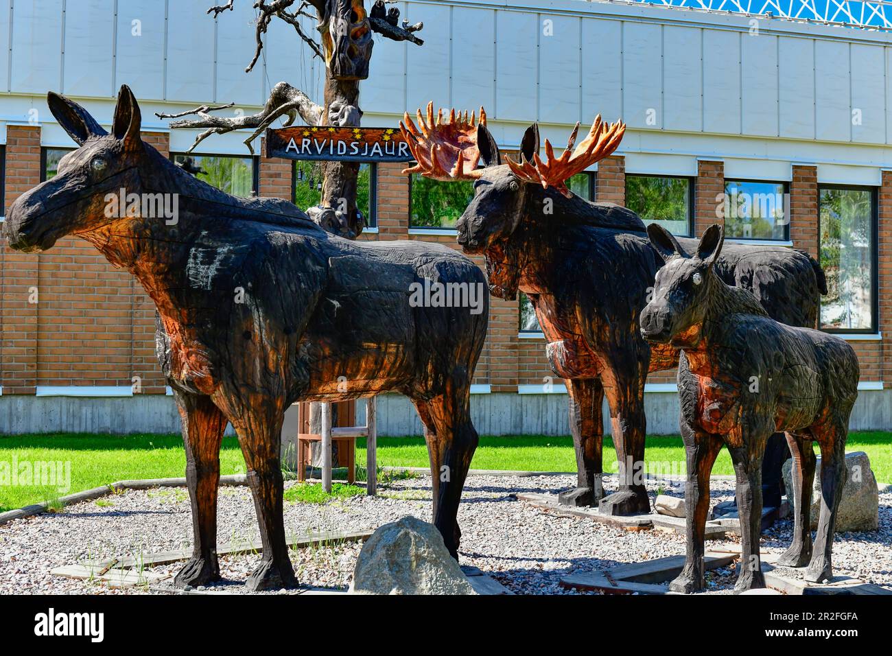 Sculpture made of moose in front of the parish hall in Arvidsjaur, Norrbotten County, Sweden Stock Photo