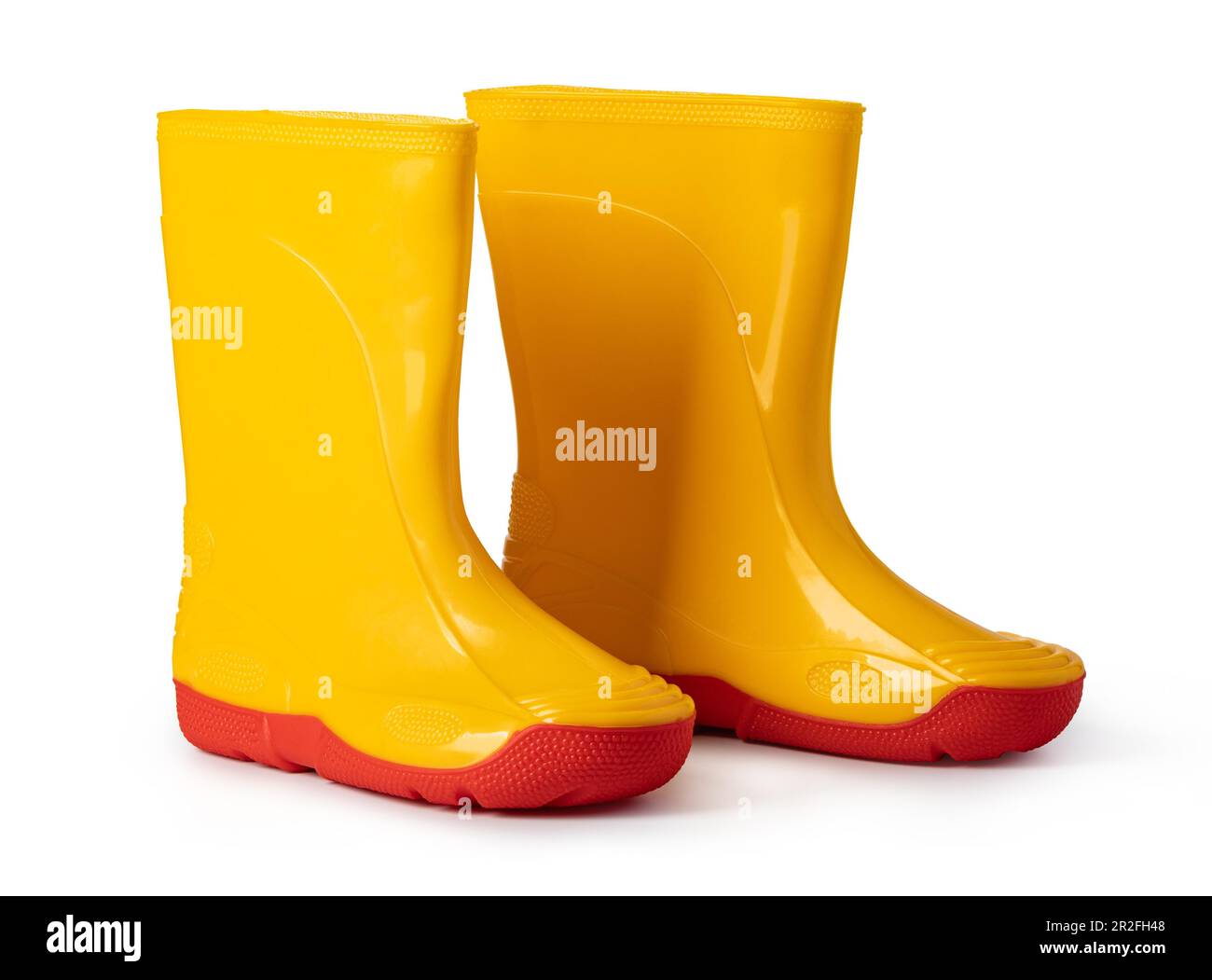 yellow rubber boots isolated on white background Stock Photo - Alamy