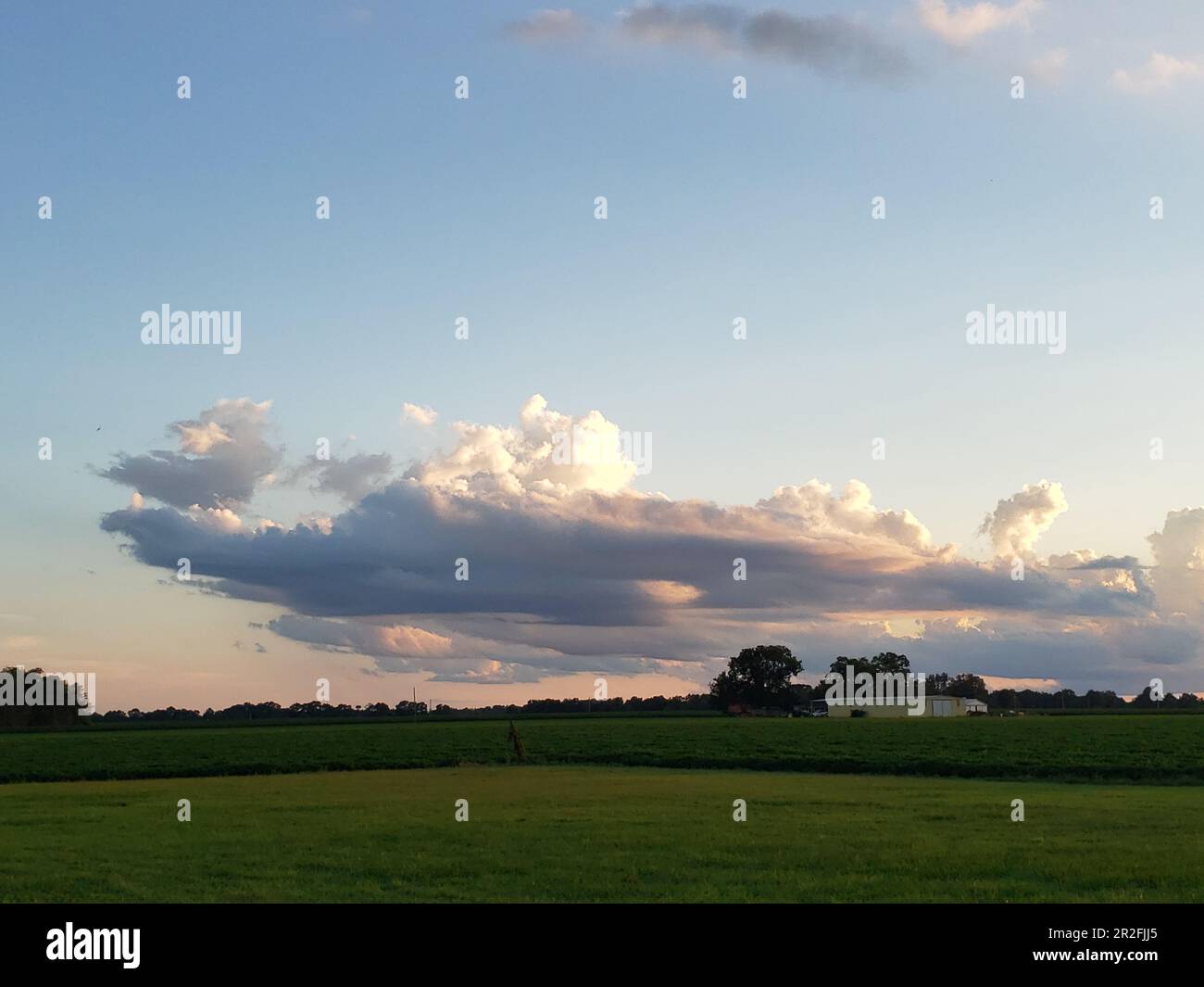Farm land open field big sky dusk clouds and sun Bratt FL Escambia