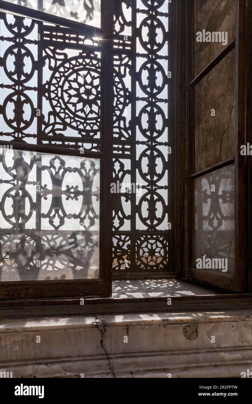 Elaborate wrought-iron window overlooking, from the Citadel, the Islamic Quarter of Cairo Stock Photo