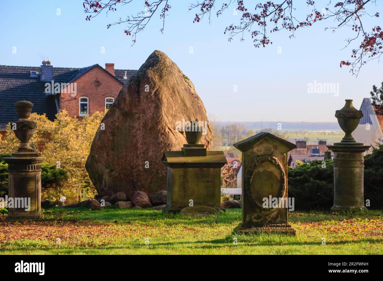 Historical cemetery at the St. Godehardi Church, Bad Nenndorf, district of Schaumburg, Lower Saxony, Germany Stock Photo