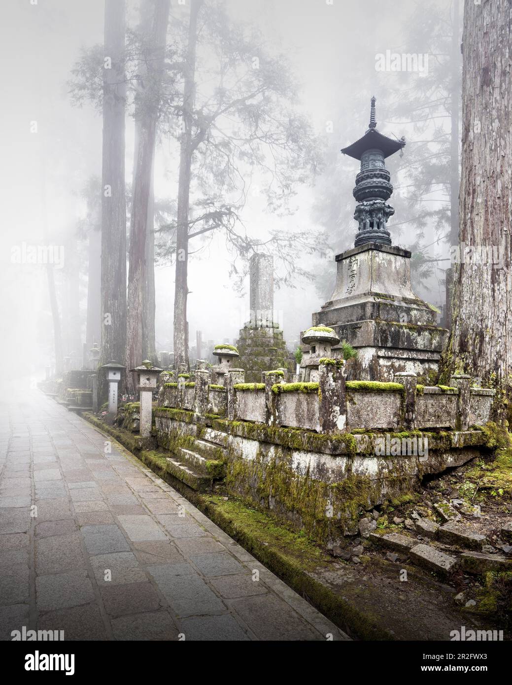 Fog over one of 200, 000 tombs at the old Okunion cemetery in KoyaSan