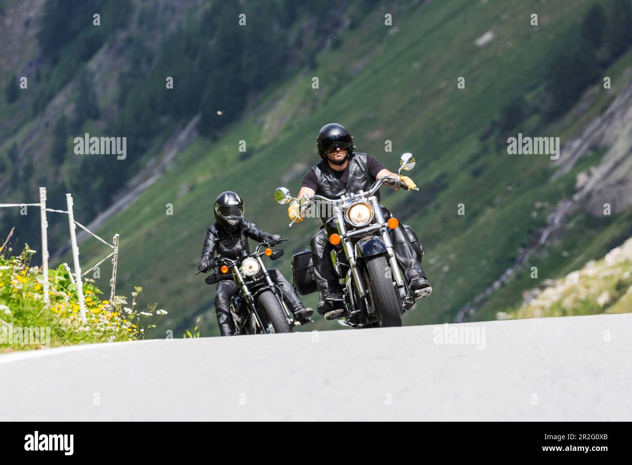 Motorbike on the winding Nufenen Pass in the Alps, popular motorbike route, Ulrichen, Obergoms, Canton Valais, Switzerland Stock Photo