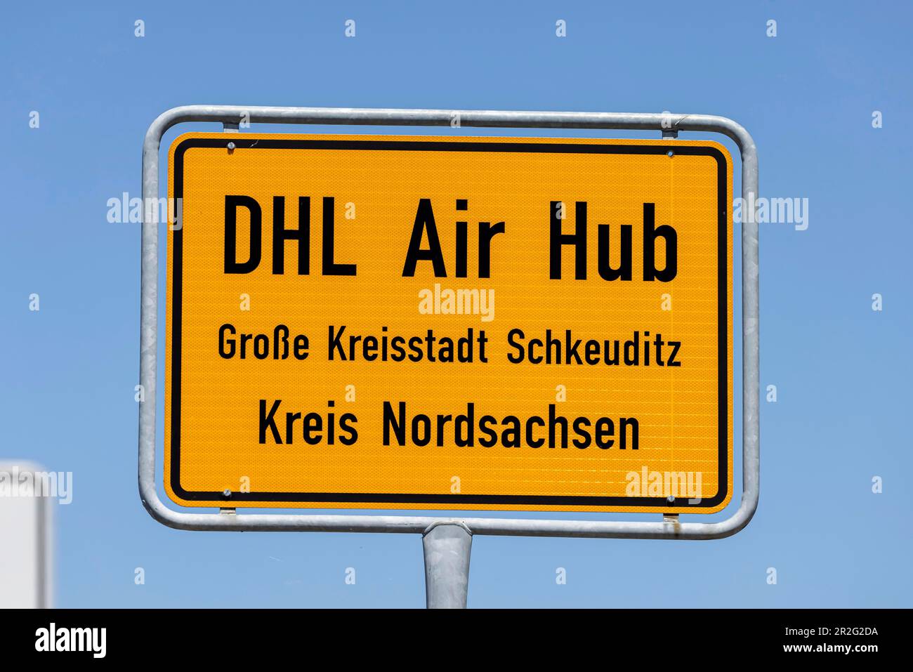 Place-name sign DHL Air Hub, Grosser Kreisstadt Schkeuditz, Saxony-Anhalt, Germany Stock Photo
