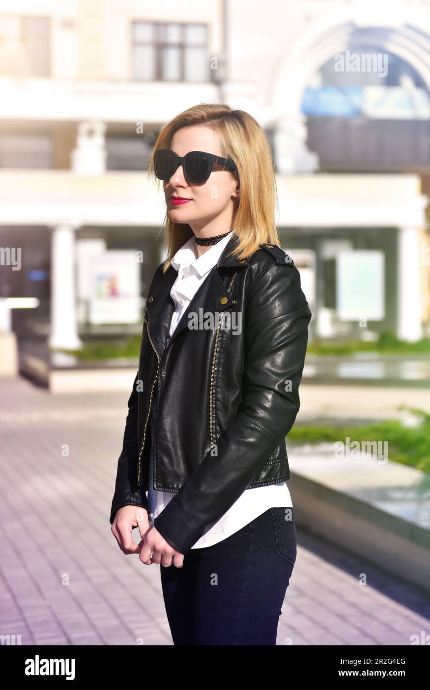 beautiful hipster girl in leather jacket, toning effect Stock Photo