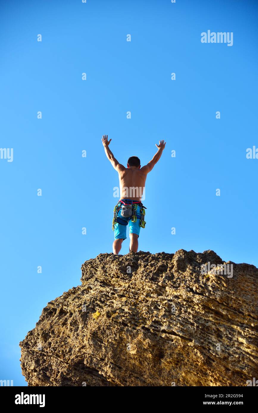 Hand on top hi-res stock photography and images - Alamy