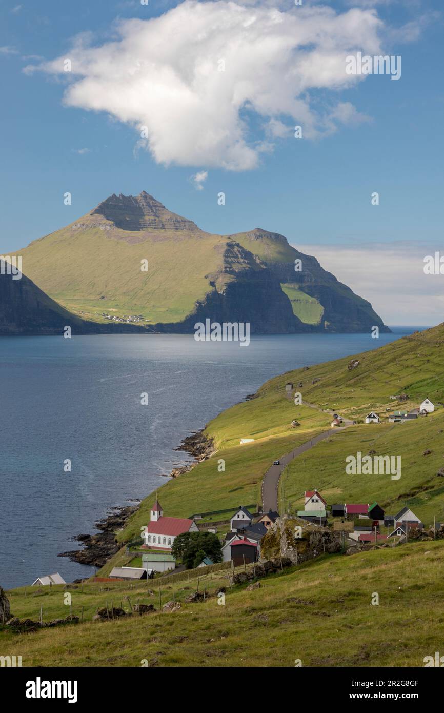 View of Kunoy village and church, Faroe Islands. mountains and fjords. Stock Photo