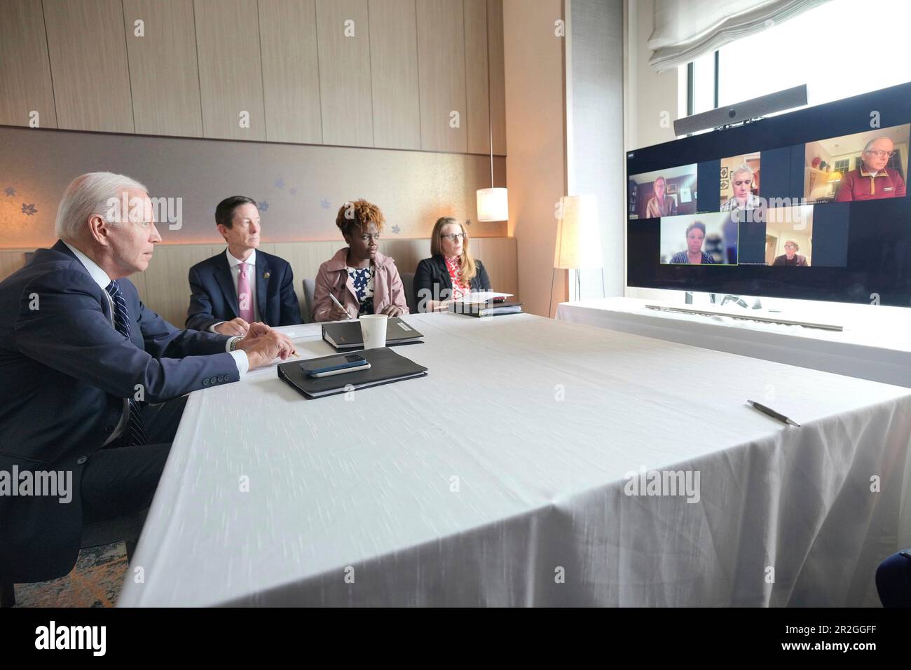 Hiroshima, Japan. 19th May, 2023. U.S President Joe Biden, left, holds a video conference with his negotiating team working with Congress on raising the debt ceiling from the sidelines of the G7 Summit, May 19, 2023 in Hiroshima, Japan. Credit: Adam Schultz/White House Photo/Alamy Live News Stock Photo