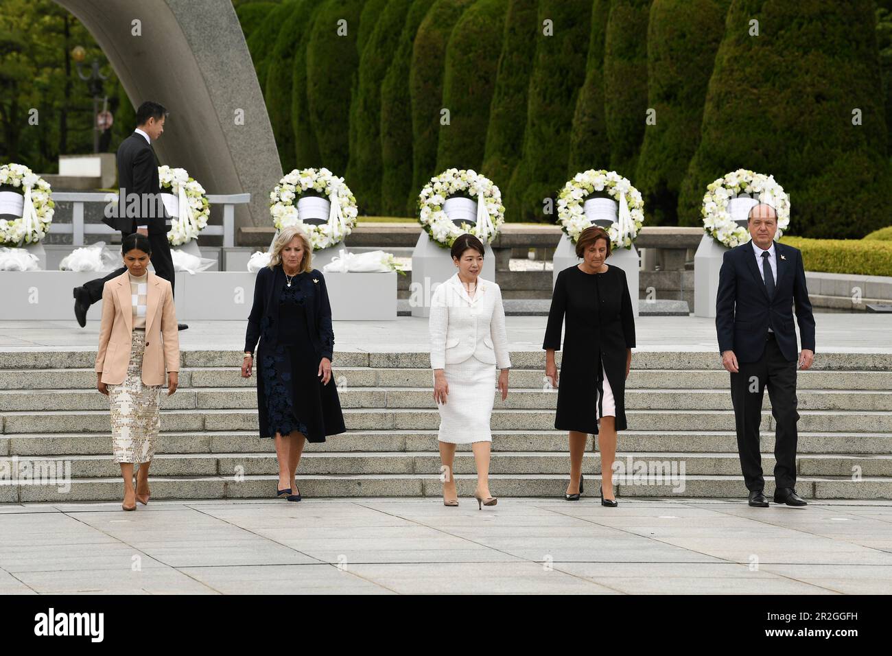 Hiroshima, Japan. 19th May, 2023. The Group of Seven spouses after a wreath ceremony at the Memorial Cenotaph in the Hiroshima Peace Memorial Park on the first day of the G7 Summit, May 19, 2023 in Hiroshima, Japan. Standing from left: Akshata Narayan Murty of the UK, U.S First Lady Jill Biden, Yuko Kishida of Japan, Britta Ernst of Germany, and Heiko von der Leyen, Spouse of the European Union President. Credit: Pool Photo/G7 Hiroshima/Alamy Live News Stock Photo