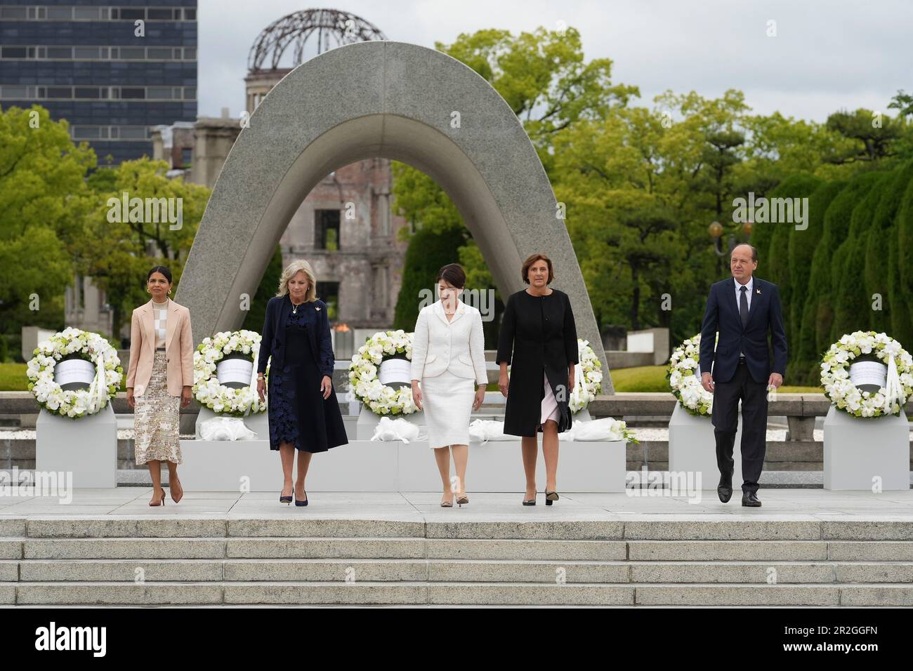 Hiroshima, Japan. 19th May, 2023. The Group of Seven spouses after a wreath ceremony at the Memorial Cenotaph in the Hiroshima Peace Memorial Park on the first day of the G7 Summit, May 19, 2023 in Hiroshima, Japan. Standing from left: Akshata Narayan Murty of the UK, U.S First Lady Jill Biden, Yuko Kishida of Japan, Britta Ernst of Germany, and Heiko von der Leyen, Spouse of the European Union President. Credit: Pool Photo/G7 Hiroshima/Alamy Live News Stock Photo