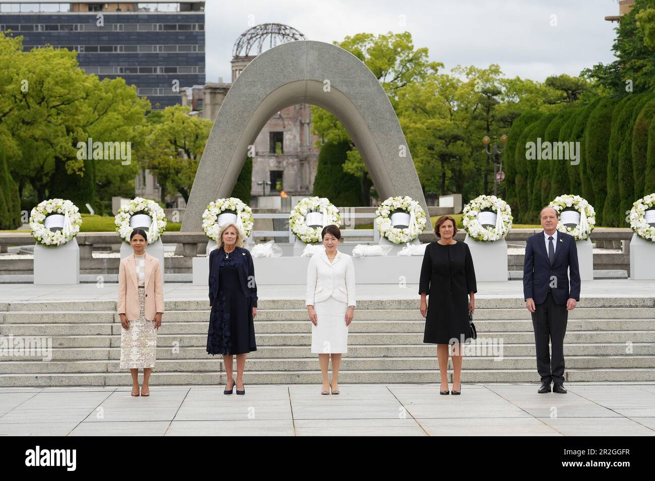 Hiroshima, Japan. 19th May, 2023. The Group of Seven spouses pose together after a wreath ceremony at the Memorial Cenotaph in the Hiroshima Peace Memorial Park on the first day of the G7 Summit, May 19, 2023 in Hiroshima, Japan. Standing from left: Akshata Narayan Murty of the UK, U.S First Lady Jill Biden, Yuko Kishida of Japan, Britta Ernst of Germany, and Heiko von der Leyen, Spouse of the European Union President. Credit: Pool Photo/G7 Hiroshima/Alamy Live News Stock Photo