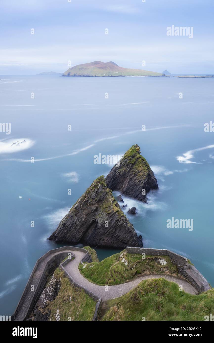 Winding path to Dunquin Pier and sea stacks. Ballyickeen Commons, County Kerry, Ireland. Stock Photo