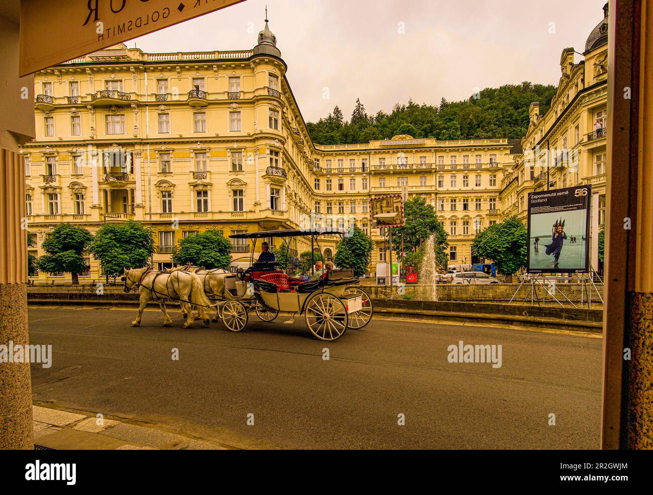 Carriage ride on the waterfront in front of the Grandhotel Pupp in Karlsbad (Karlovy Vary), Czech Republic Stock Photo