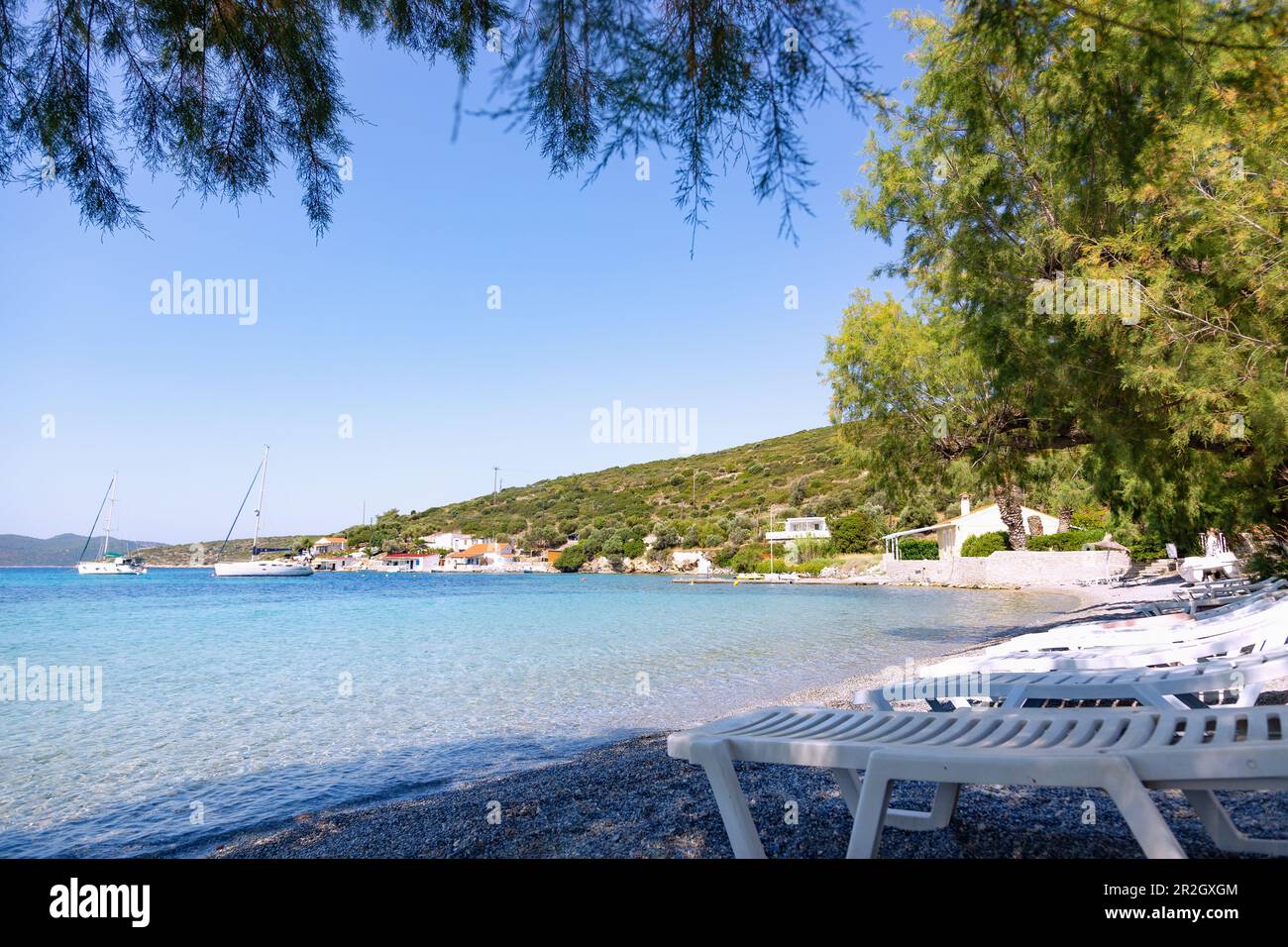 Pebble beach in Posidonio on the east of Samos island in Greece Stock Photo