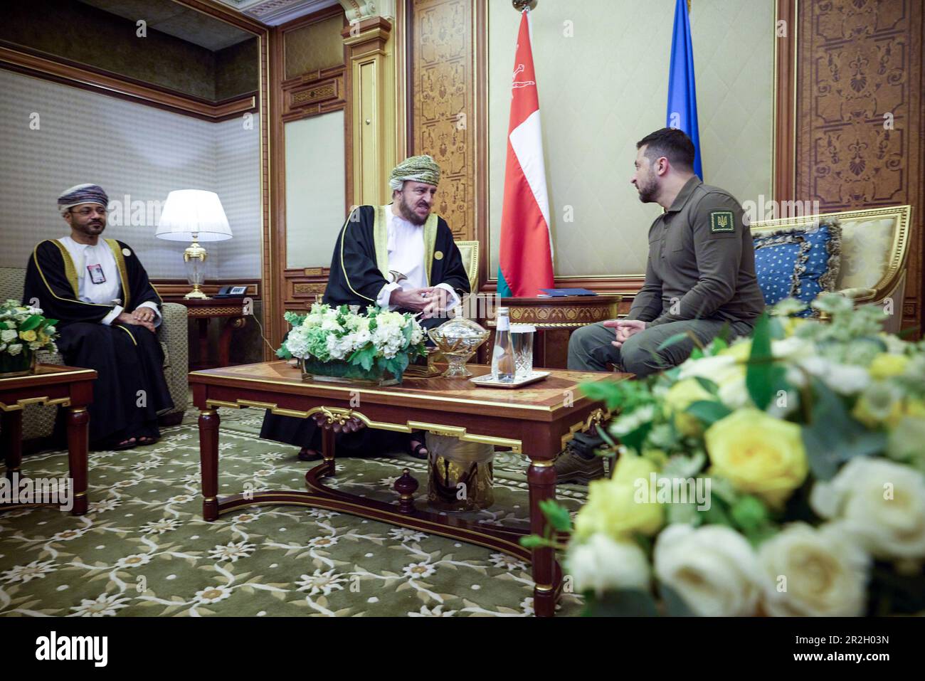 Jeddah, Saudi Arabia. 19th May, 2023. Ukrainian President Volodymyr Zelenskyy, right, during a face-to-face meeting with Sultanate of Oman Deputy Prime Minister Asaad bin Tarik Al Said, center, on the sidelines of the Arab League Summit, May 19, 2023 in Jeddah, Saudi Arabia. Zelenskyy attended the annual summit meeting as part of a broader pitch for global support against the Russia invasion of Ukraine. Credit: Pool Photo/Ukrainian Presidential Press Office/Alamy Live News Stock Photo